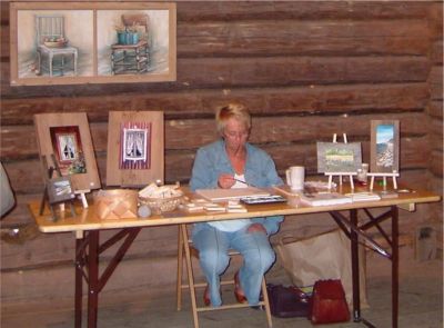 Cina målar tavlor på Skansen (pensionärernas dag), 19/8 -04