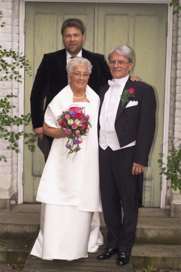 Pastorn och brudparet.